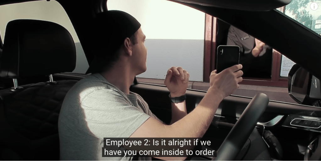 In this scenario, he met rude employees who were not willing to read his screens and even asked him to order inside.
Screenshot from YouTube: Deaf Man vs. Drive Thru: They Threw Away My Food!, Sign Duo
